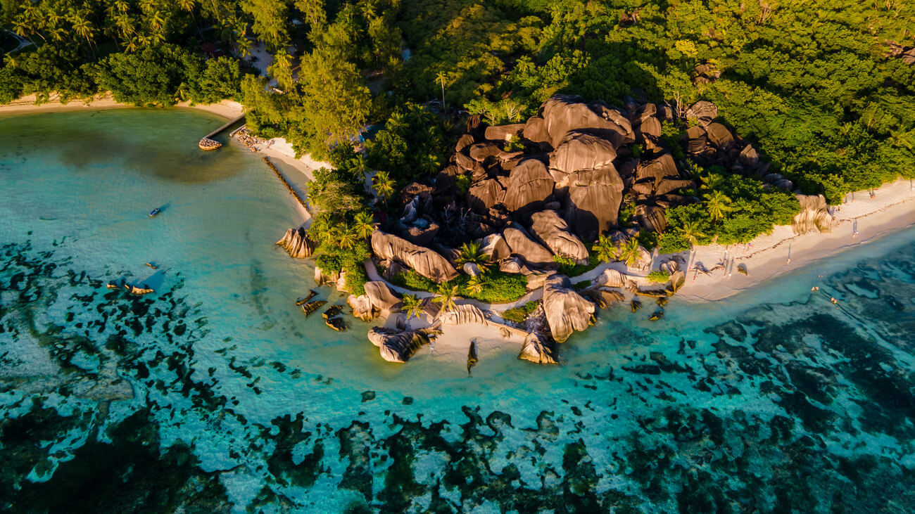 anse-source-d-argent-beach-la-digue-island-seyshelles-drone-aerial-view-la-digue-seychelles-bird-eye-viewof-tropical-island (1)