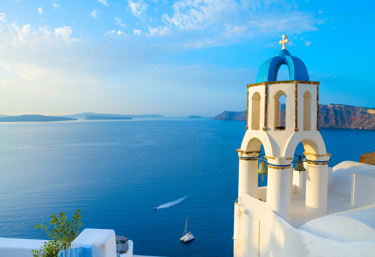 church-oia-with-traditional-belfry-santorini-greece